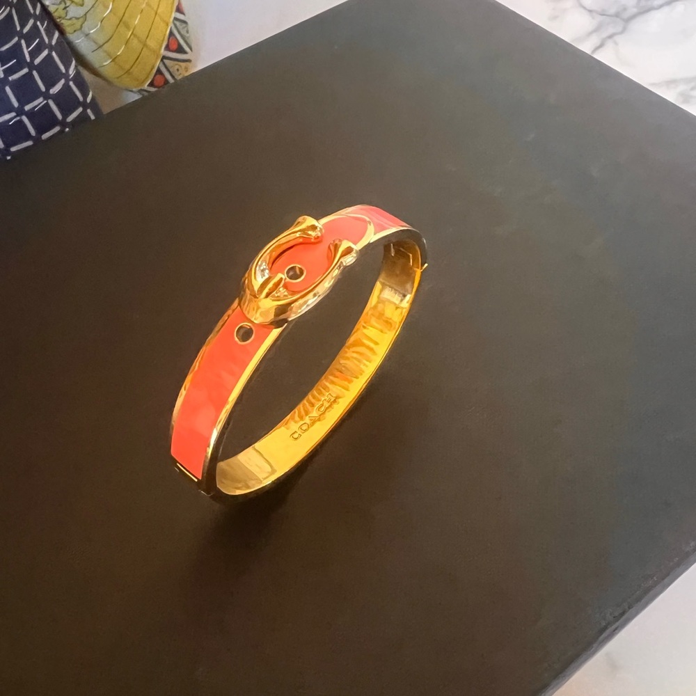 Coach signature sculpted "C" push hinged bracelet in Petunia Pink & Gold tone